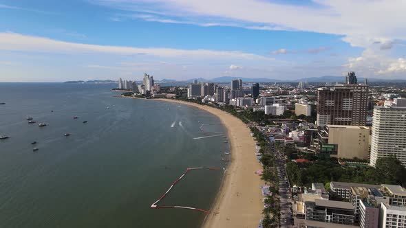 Aerial view of Pattaya Beach and cityscape, sliding and rotatingement