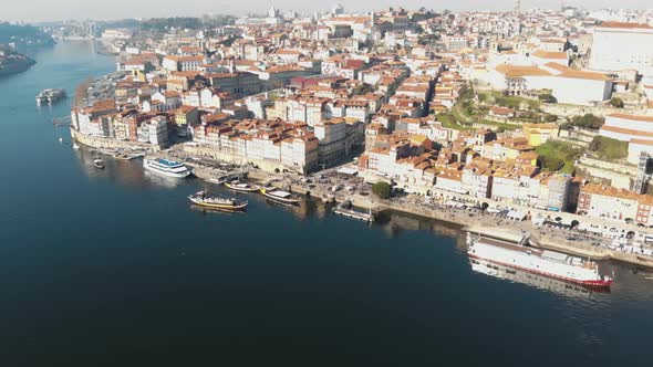 Panoramic view of Ribeira, Porto, and Douro river. Aerial manning shot