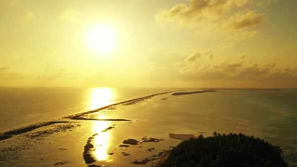 Aerial above texture of relaxing coastline beach lifestyle by blue green sea and white sand backgrou