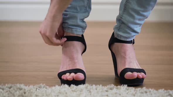 Close-up of Male Caucasian Feet Entering the Shot, Man Taking Off High Heels, and Leaving