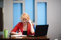 Redhead businesswoman have phone call at the office - PhotoDune Item for Sale