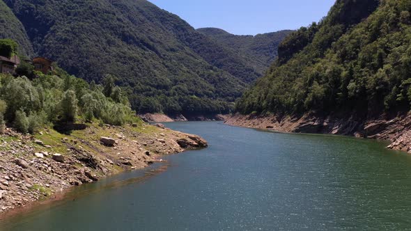 Drone flight over Verzasca reservoir in Ticino, Switzerland