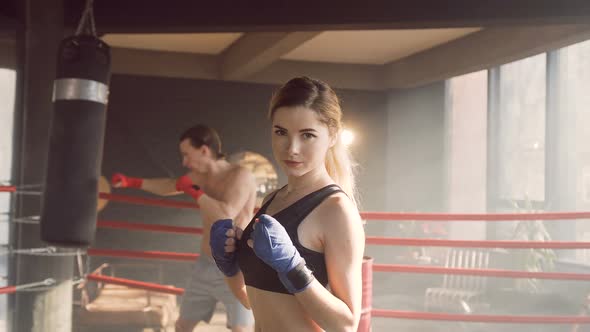 Portrait of Female Boxer in the Boxing Club