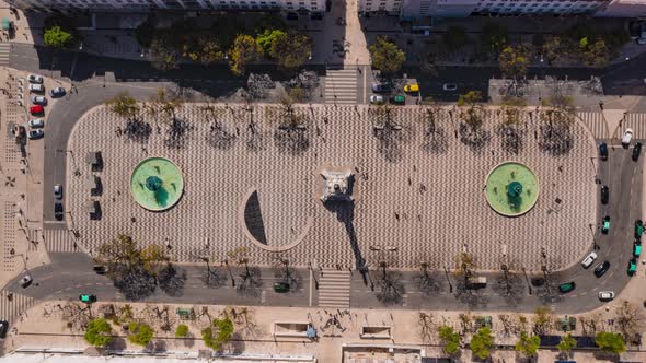 Overhead Aerial Hyperlapse of People on Large Public Square Surrounded By Residential Houses in