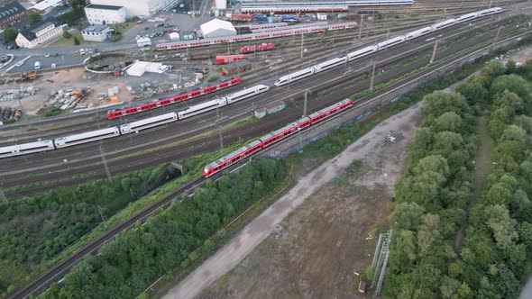 Cologne, Germany - Aerial bird view following 3 commuter regio trains arriving in the Köln HBF centr