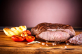 Grilled beef Steak with fried onions and cherry tomatoes - PhotoDune Item for Sale