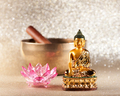 Singing Bowl, lotus flower and Buddha statue. meditation concept - PhotoDune Item for Sale