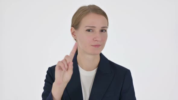 Young Businesswoman Showing No Sign By Finger on White Background