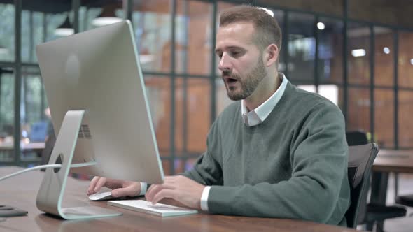 Stressed Man Get Shocked While Working on Computer