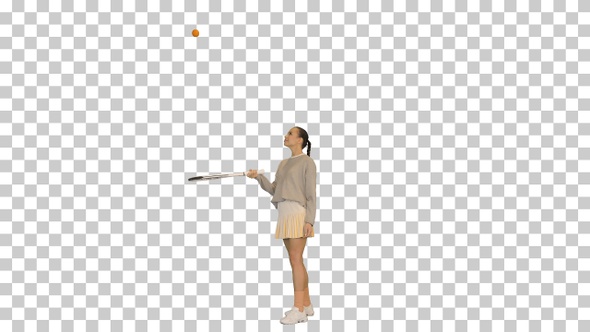 Young woman bouncing a ball on her tennis racket, Alpha Channel