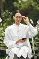 Young attractive woman in a white doctor's coat - PhotoDune Item for Sale