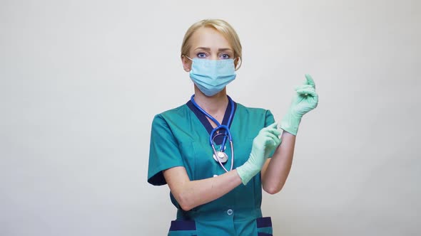 Medical Doctor Nurse Woman with Stethoscope Over Light Grey Background - Wearing Protective Mask