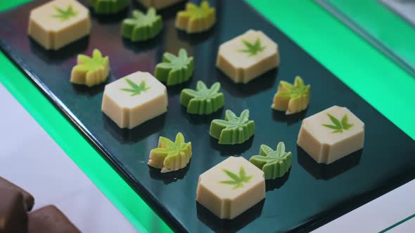 Cute Green and White Weed Sweets in the Shape of Marijuana Leaves