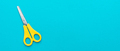 Flat Lay Photo of Yellow Scissors on The Blue Background with Copy Space - PhotoDune Item for Sale