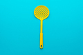 Top View of Yellow Skimmer Spatula on Turquoise Blue Background with Copy Space - PhotoDune Item for Sale