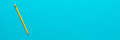 Photo of Yellow Pencil Over Turquoise Blue Background with Copy Space - PhotoDune Item for Sale