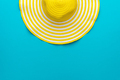 Top View of Yellow Hat on Blue Background with Copy Space - PhotoDune Item for Sale