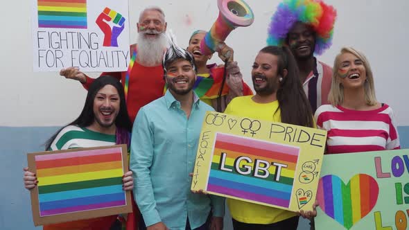 Happy Multiracial people celebrating gay pride event
