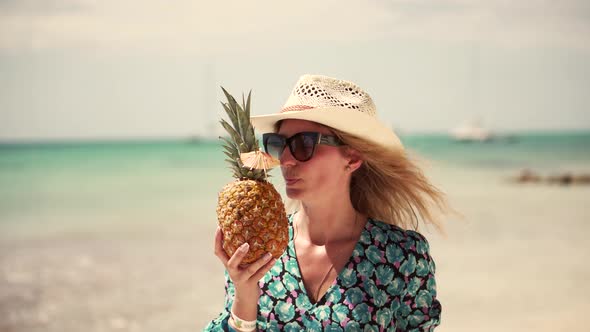 Tropical Beach Happy Female. Girl Drinking Pina Colada Cocktail On Tropical Beach. Pineapple.