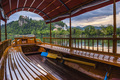 Pletna rowing boat and Lake Bled Castle, Slovenia in Bled, Julian Alps, Gorenjska, Upper Carniola Re - PhotoDune Item for Sale