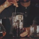 Bartender Prepares a Cocktail at the Bar - VideoHive Item for Sale