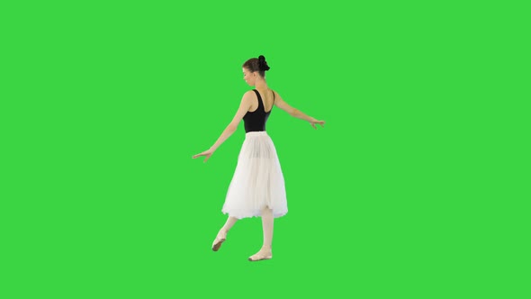 Young Ballerina Performing Basic Movements on a Green Screen Chroma Key