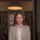 Smiling caucasian girl intern standing at modern office coworking space. Portrait of young female - VideoHive Item for Sale