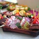 A set of meat canape snack in a wooden plate on a buffet table - VideoHive Item for Sale