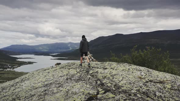 Drone Over Boy To Mountains And Lake