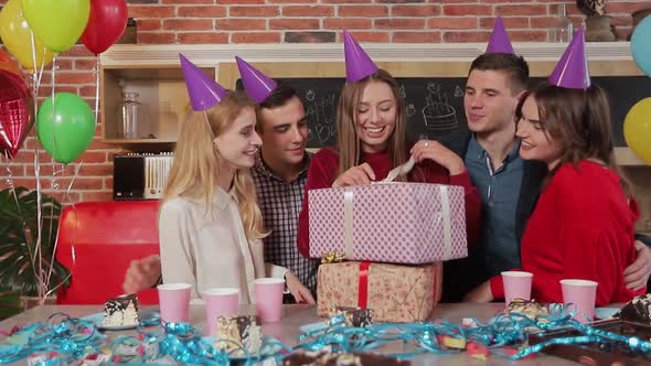 Excited Girl, Surrounded By Sincere Friends, Opening Birthday Presents, Young Beautiful Brunette