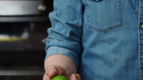 Tracking video of fun in the kitchen with lime.