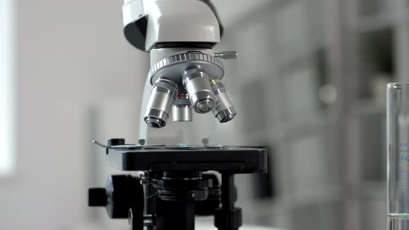 Close Up Shot of Compound Microscope in Lab