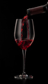 red wine pouring in glass - PhotoDune Item for Sale