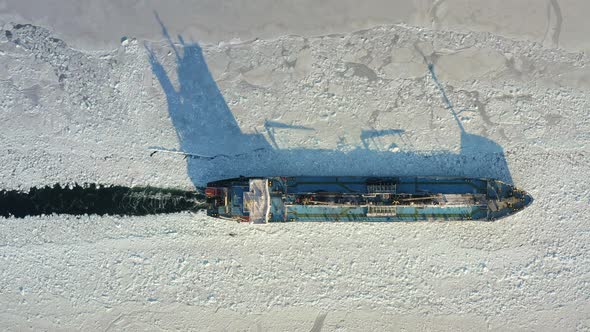 The Tanker Sails on the Sea at Sunset