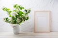 Wooden frame mockup with apple blossom in the vase - PhotoDune Item for Sale