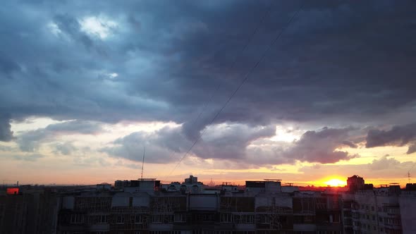 Nightfall Over the Big City. Fast Moving Clouds.