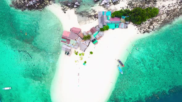 Aerial view of drone, Scene of Beautiful nature Top view of White beach sand in summer day, Seawater