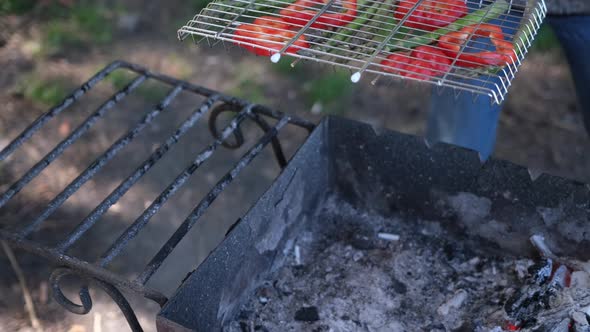 Making Grilled Vegetables  Asparagus and Red Pepper on a Charcoal Grill