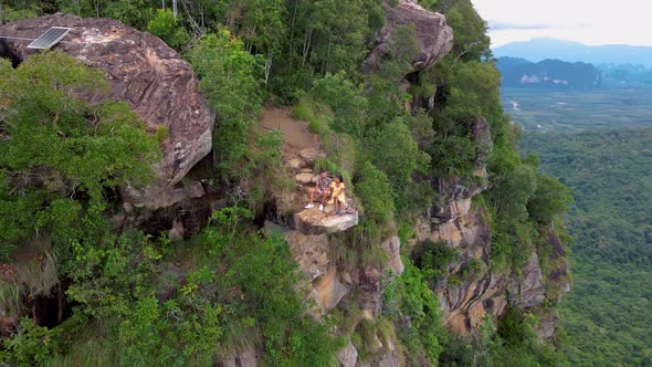 Dragon Crest Rock in the Jungle of Krabi Thailand Couple Men and Woman Looking Out Over Jungle