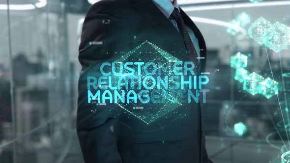 Businessman with Customer Relationship Management Hologram Concept