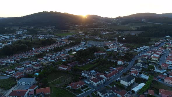 Aerial View of Residential Houses in Suburban Rural Area at Sunset