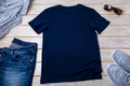 Unisex navy blue T-shirt mockup with trainers and jeans - PhotoDune Item for Sale