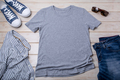 Gray T-shirt mockup with sneakers and striped shirt - PhotoDune Item for Sale