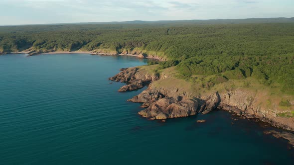 Drone flight around a picturesque rocky coastline