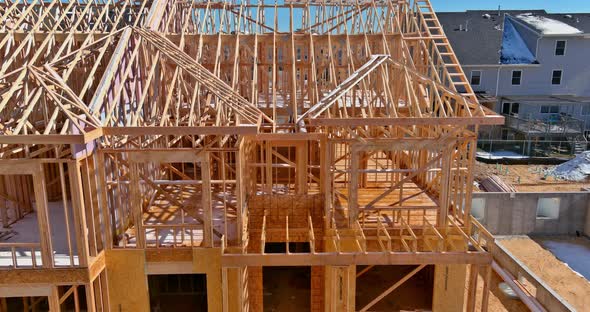Roofing Structures House Construction in Wooden Roof Frame Installation the Truss Beams