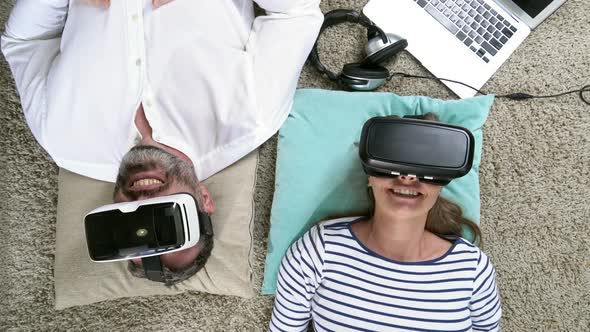 Couple in VR Headsets