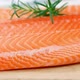 Fresh raw salmon fillet on wooden board, dolly shot - VideoHive Item for Sale