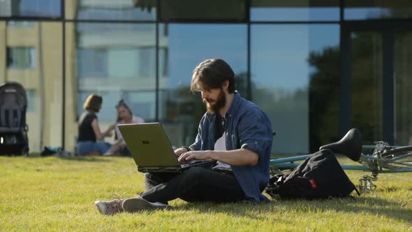 Man Studies Near University