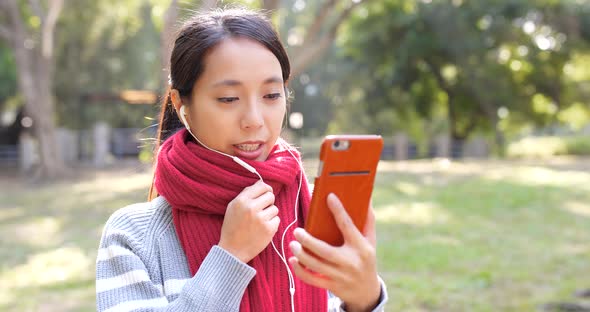 Woman Making Video Live Stream on Cellphone