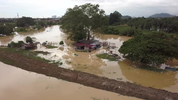 Kampung house flooded in day